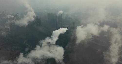 Top View of the Metallurgical Plant. Smoke Coming Out of Factory Pipes. Ecology