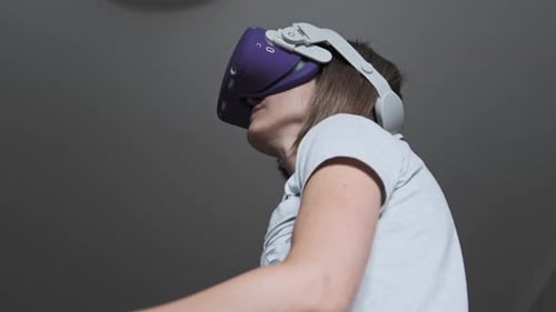 Woman Using Virtual Reality Headset