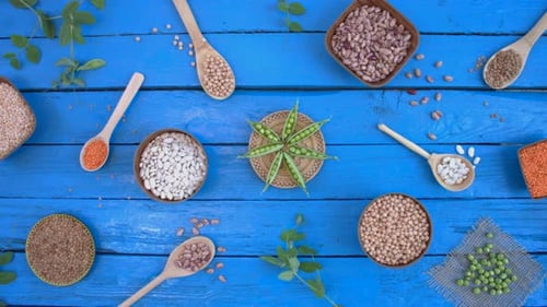 Variety of Lentils and Beans on a Wooden Table