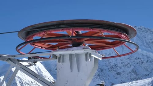 Huge Reel with Cable Rotates to Move Poma Lift at Ski Resort
