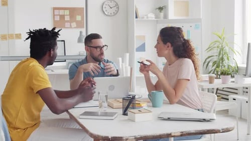 Three Multiethnic Colleagues in Office