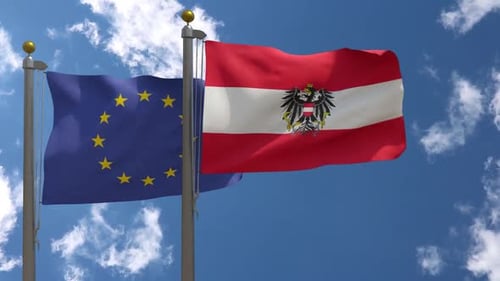 European Union and Austrian Flags Waving on Flagpoles