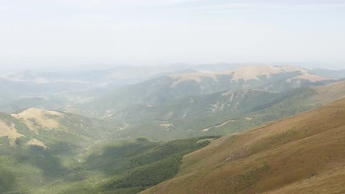 View from Midzor peak by the day slow pan 4K 2160p 30fps UltraHD footage - Panning on highlands of