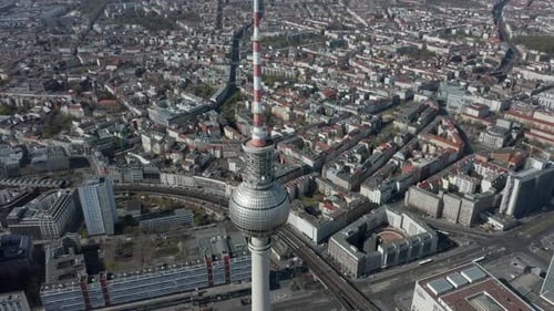 AERIAL: Close View of Alexanderplatz TV Tower in Empty Berlin, Germany with No People or Cars on