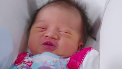 Close Up of a Newborn Baby Resting