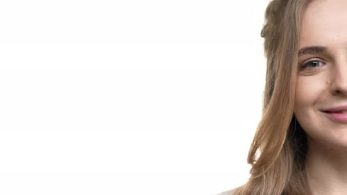 Close Up of Blonde Woman Smiling on White Background