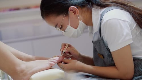 Toenail Polish Application at a Nail Salon