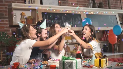 Friends Celebrating Birthday with Champagne and Confetti