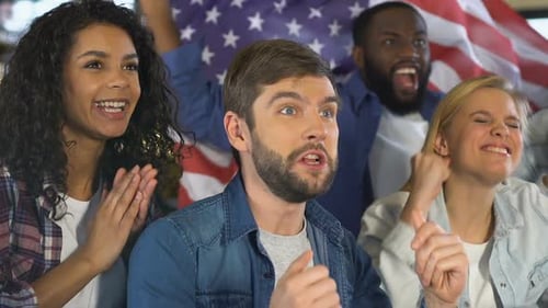 Four Adults Cheering Together