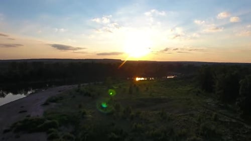 Aerial Landscape with Small River at Sunset