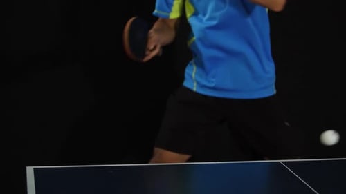 Man Playing Ping Pong In Action