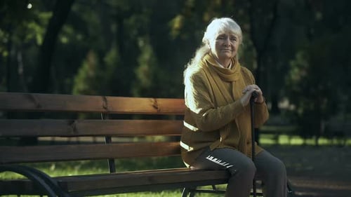 Sad Lonely Old Woman Sitting on Bench in Park, Abandoned Elderly People Alone