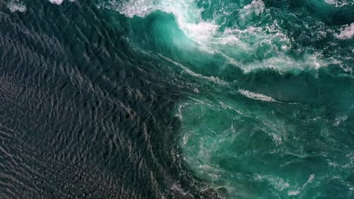 Waves of Water of the River and the Sea Meet Each Other During High Tide and Low Tide