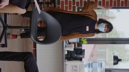 Woman Giving Energetic Presentation to Colleagues in Office