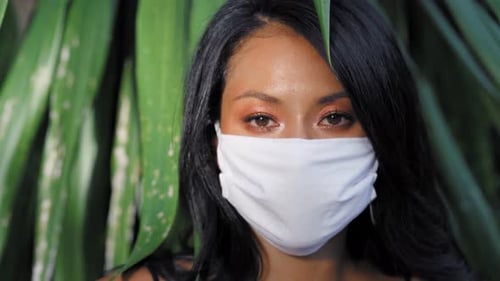Beautiful Asian Woman Wearing Surgical Face Mask