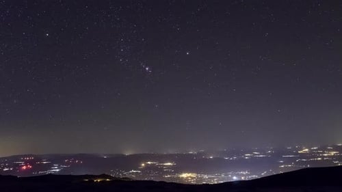 Movement of the stars with Orion over portuguese cities from highest mountain Torre, Serra da Estrel