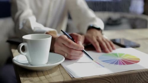 Business Analysis and Review at Wooden Desk