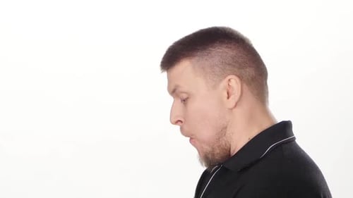 Man Eating a Hamburger Profile Close Up