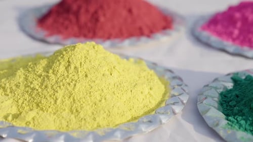 Plates of Colorful Holi Festival Powder