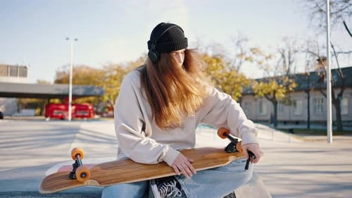 Young Confident Skater Girl Fixes Her Skate Using Allen Key
