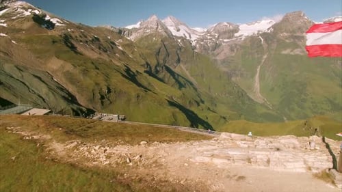 Grosslockner with Austrian flag in the Alps