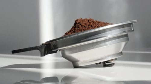 Tilting on coffee machine holder 4K video