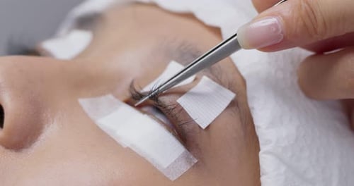 Application of Eyelash Extensions Close Up