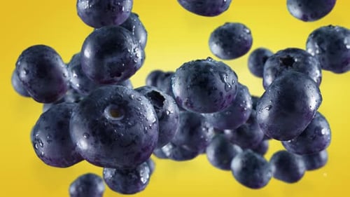 Floating Blueberries Against Yellow Background