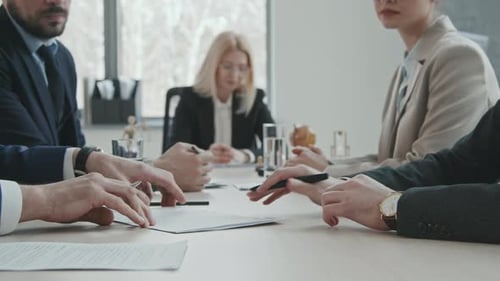 Colleagues Shake Hands to Seal a Business Deal
