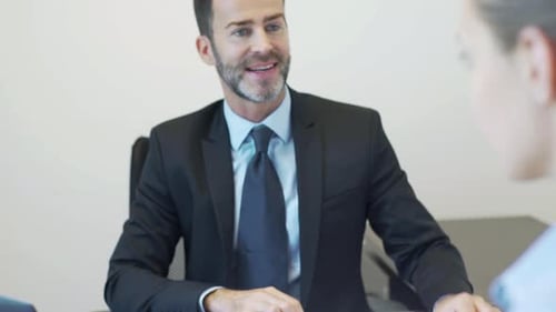 Real estate agent meeting with client