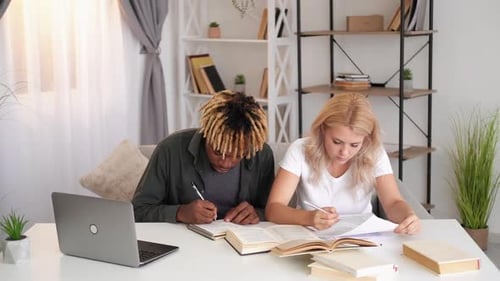 Young Adults Studying Together at Home