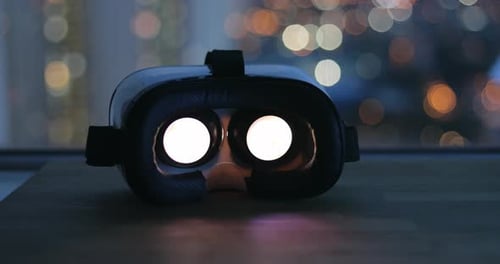 Virtual Reality Headset with City Lights Background