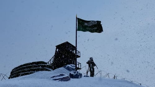 Soldier Guarding Snowy Watchtower with Flag Animation in Winter