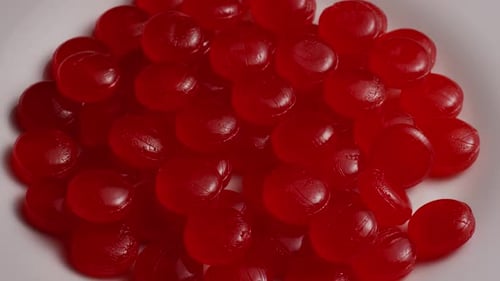 Rotating shot of cinnamon candies - CANDY CINNAMON 041