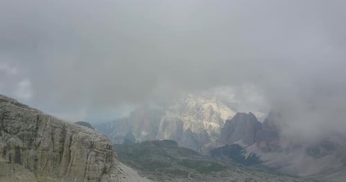 Aerial drone view of fog and foggy landscapes in the mountains.