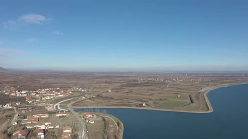 Above settlement on Danube river banks 4K drone video