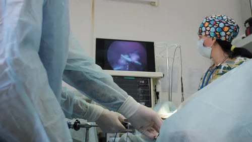 Doctors Performing Surgery in an Operating Room
