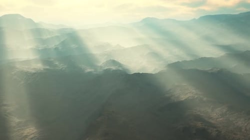 Aerial Vulcanic Desert Landscape with Rays of Light
