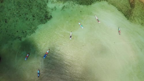 Aerial View of Boats in Turquoise Tropical Water