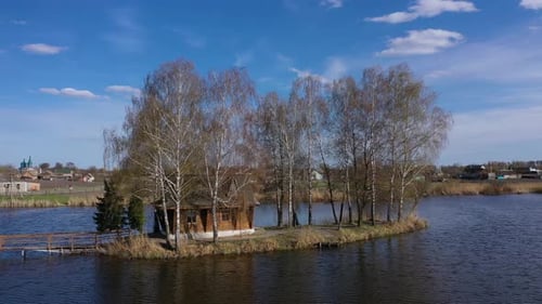 Natural Landscape With an Abandoned Hunter's House on the Island. Village Old Solotvino, Ukraine