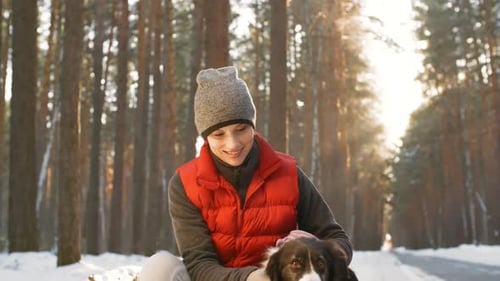 Woman Stroking Border Collie Dog