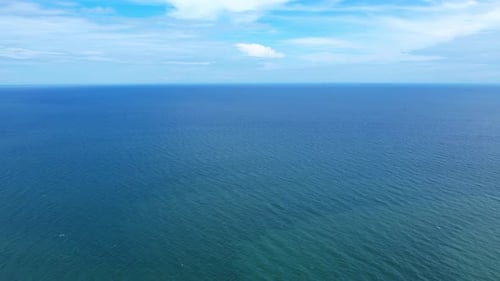 4K Aerial view of drone move on beautiful sea. Flight over ocean, open sea.