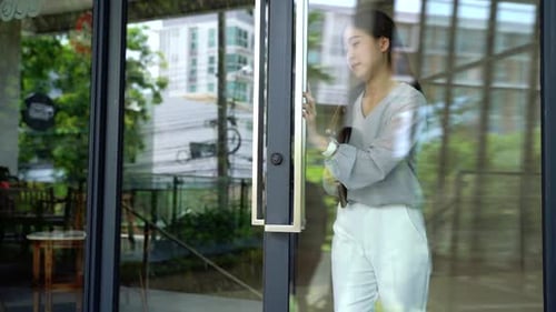 Asian Female Businesswoman Check Time with Watch at Modern Office Building Outside and Run on Rush