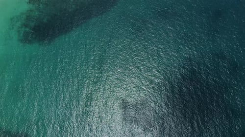 Aerial view of blue ocean wave