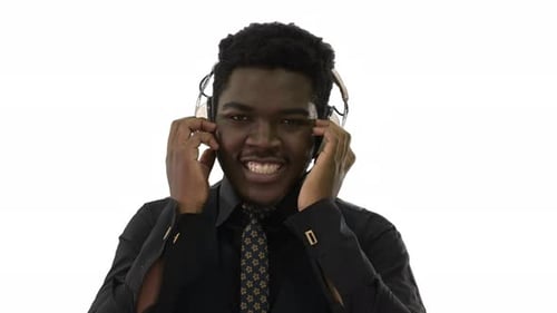 Man with Headphones Listening to Music