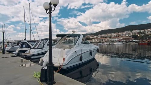 Yachts on the Pier at Sunny Day
