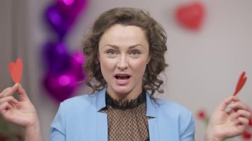 Closeup Portrait of Gorgeous Adult Excited Funny Brunette Woman with Green Eyes Closing with Heart