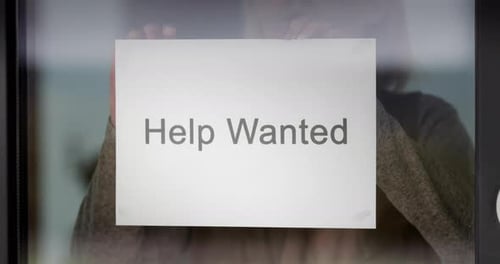 Worker Removes and Rips Apart Ad Help Wanted