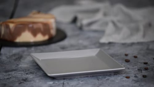 Slice of Layered Coffee Cake Being Served