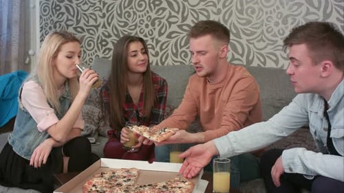 Group of Friends Eating Takeaway Pizza and Drinking Orange Juice